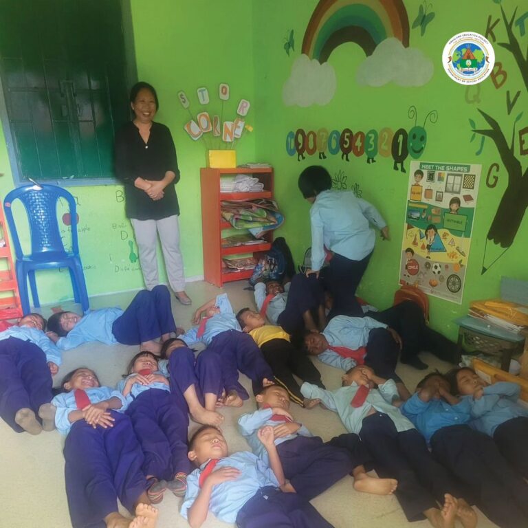 DEO Mokokchung observing the Early Childhood Care and Education (ECCE) class at GMS Marepkong in Mokokchung District